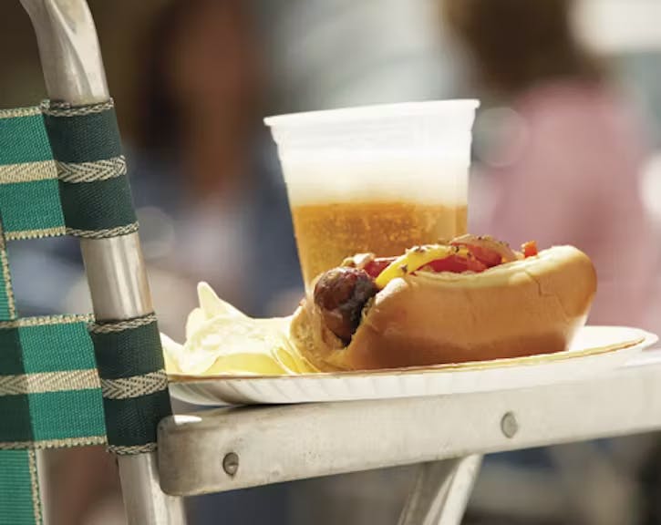 Brats with Stewed Spicy Peppers