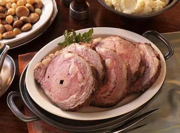 Rotisserie Prime Rib with Cognac Mushrooms and Pearl Onions